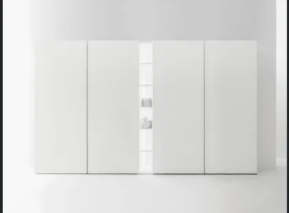 Armadio dispensa in essenza natural wood con ante complanari di Caccaro
