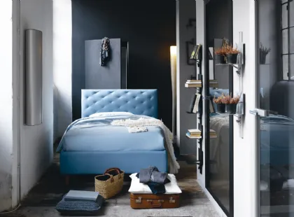 Letto in ecopelle con testiera capitonnè e contenitore So Ever di Noctis