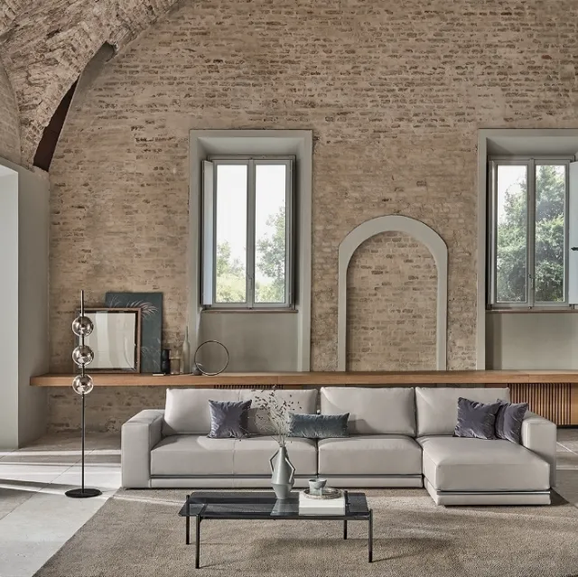 Divano in ecopelle con penisola Pitagora di Bontempi